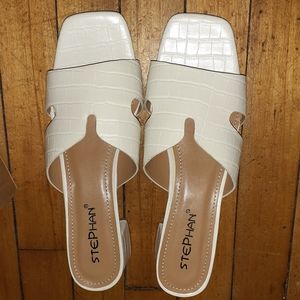 White heeled sandals